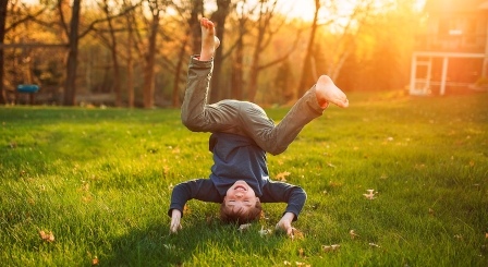 Child doing a forward roll